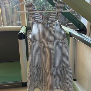 Blue and white striped dresss with eyelet detail at hem